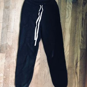 Naked Cashmere Quinn joggers in Black